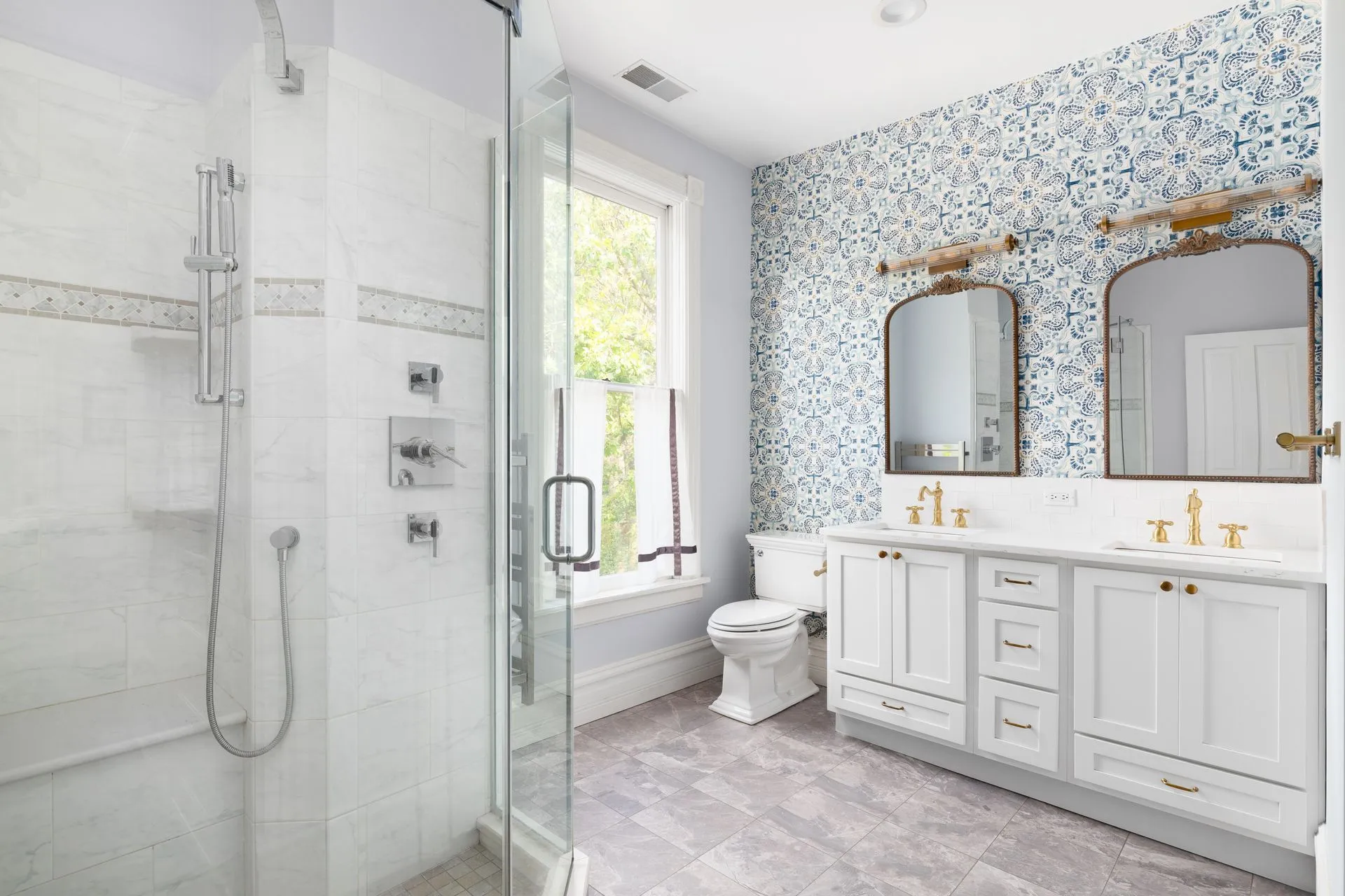 Finished bathroom remodel with a glass-door walk-in shower and a double vanity